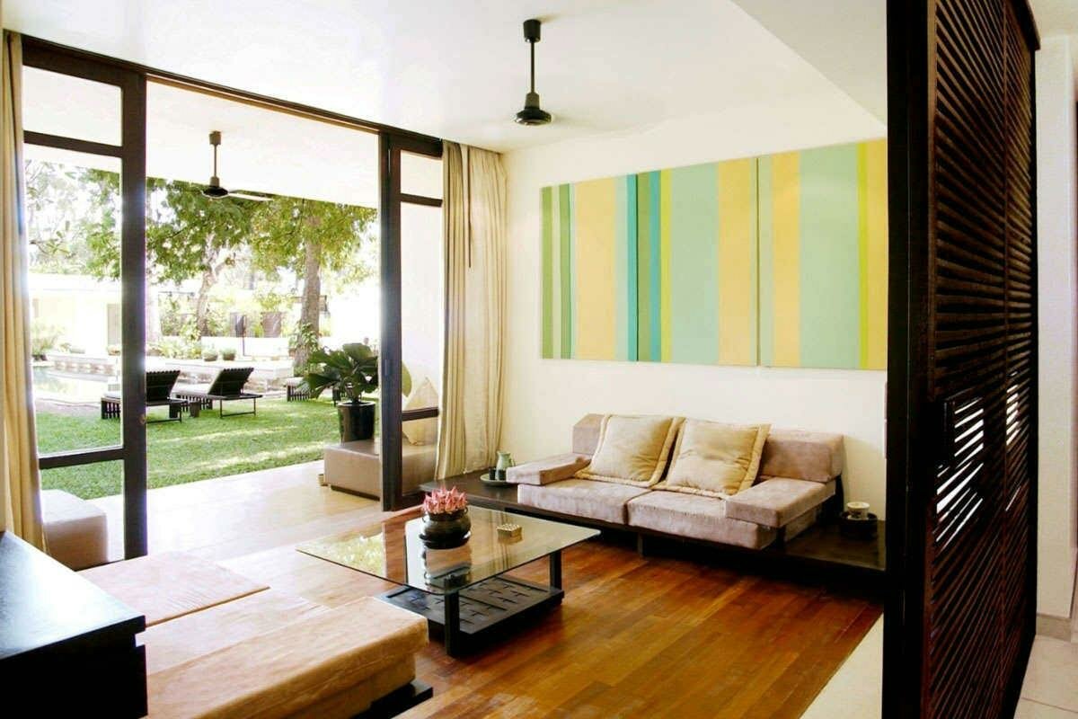 Vue sur jardin et piscine d'une Suite 